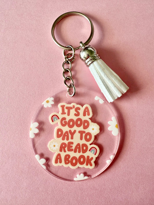 ACRYLIC CIRCLE KEYCHAIN - IT'S A GOOD DAY TO READ A BOOK